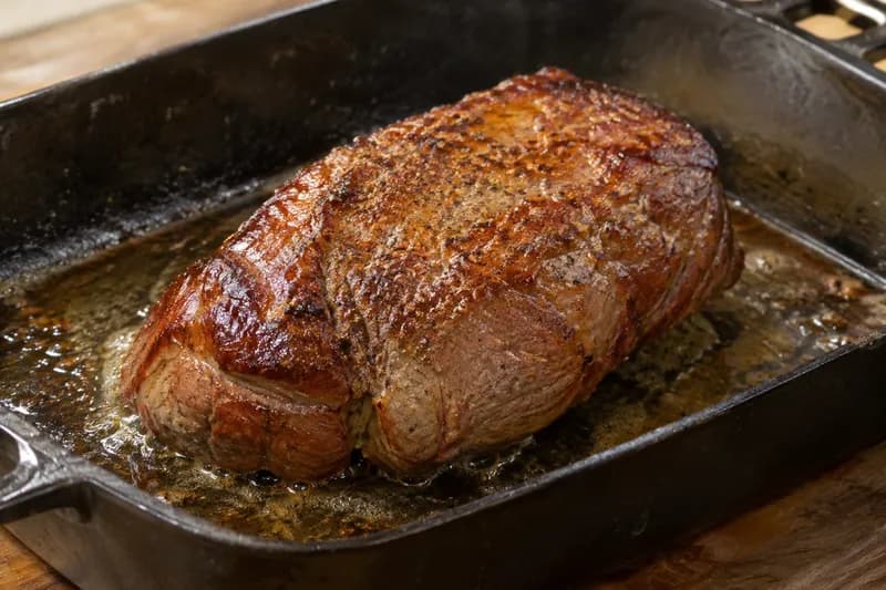 Marinade passieren und Fleisch anbraten