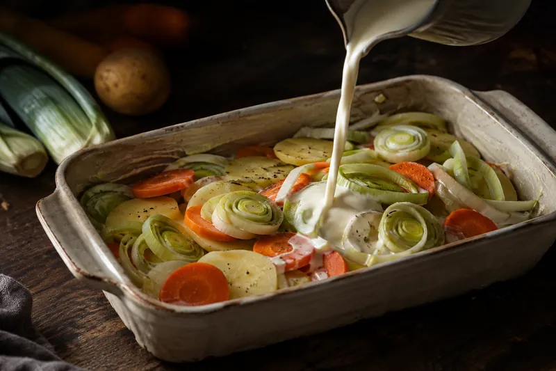 Ofen vorheizen und Gratin vorbereiten